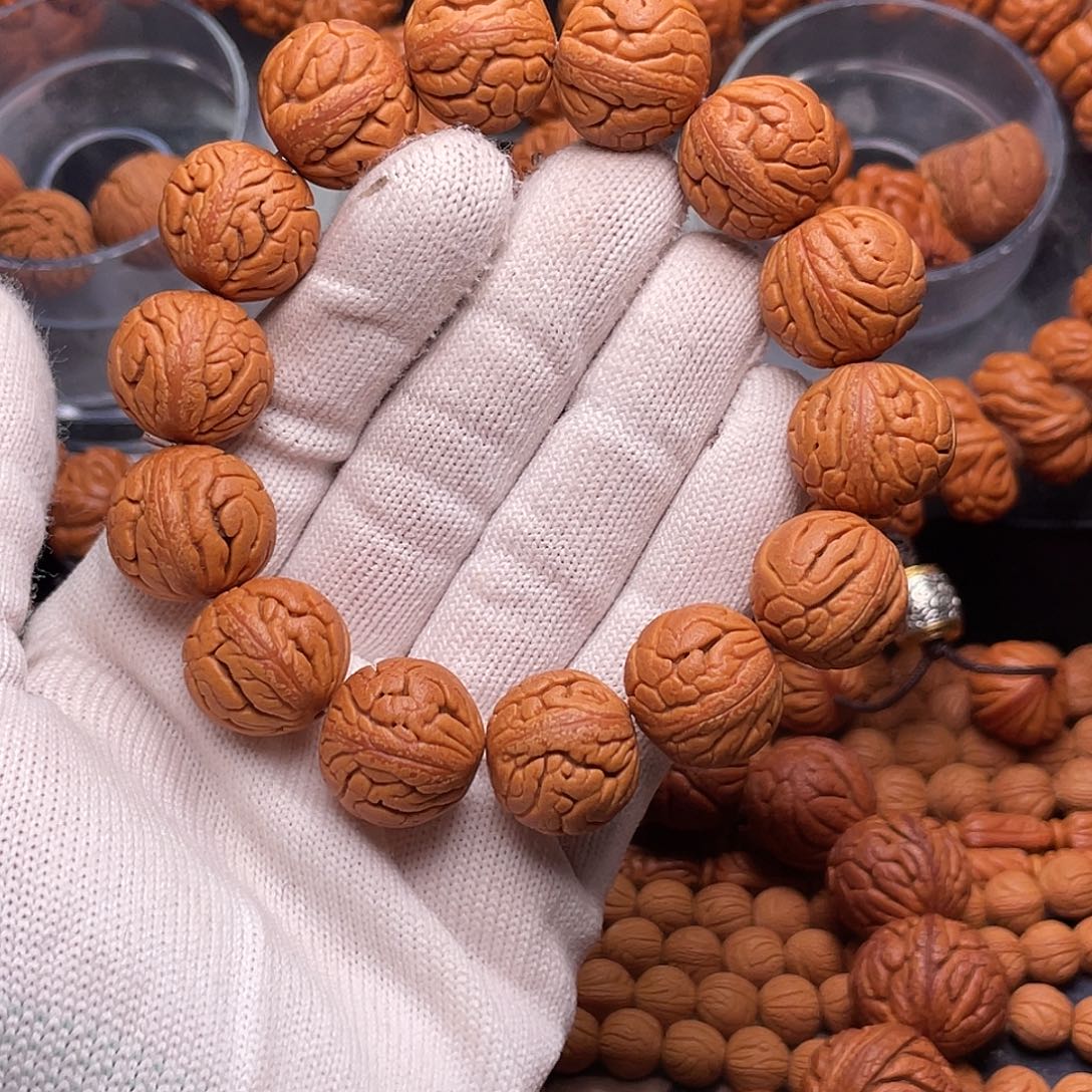 桃核手串金丝龙珠手串