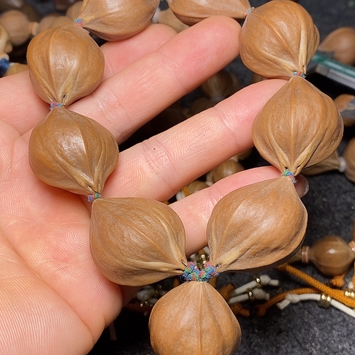 橄榄核手串2.4四花14号