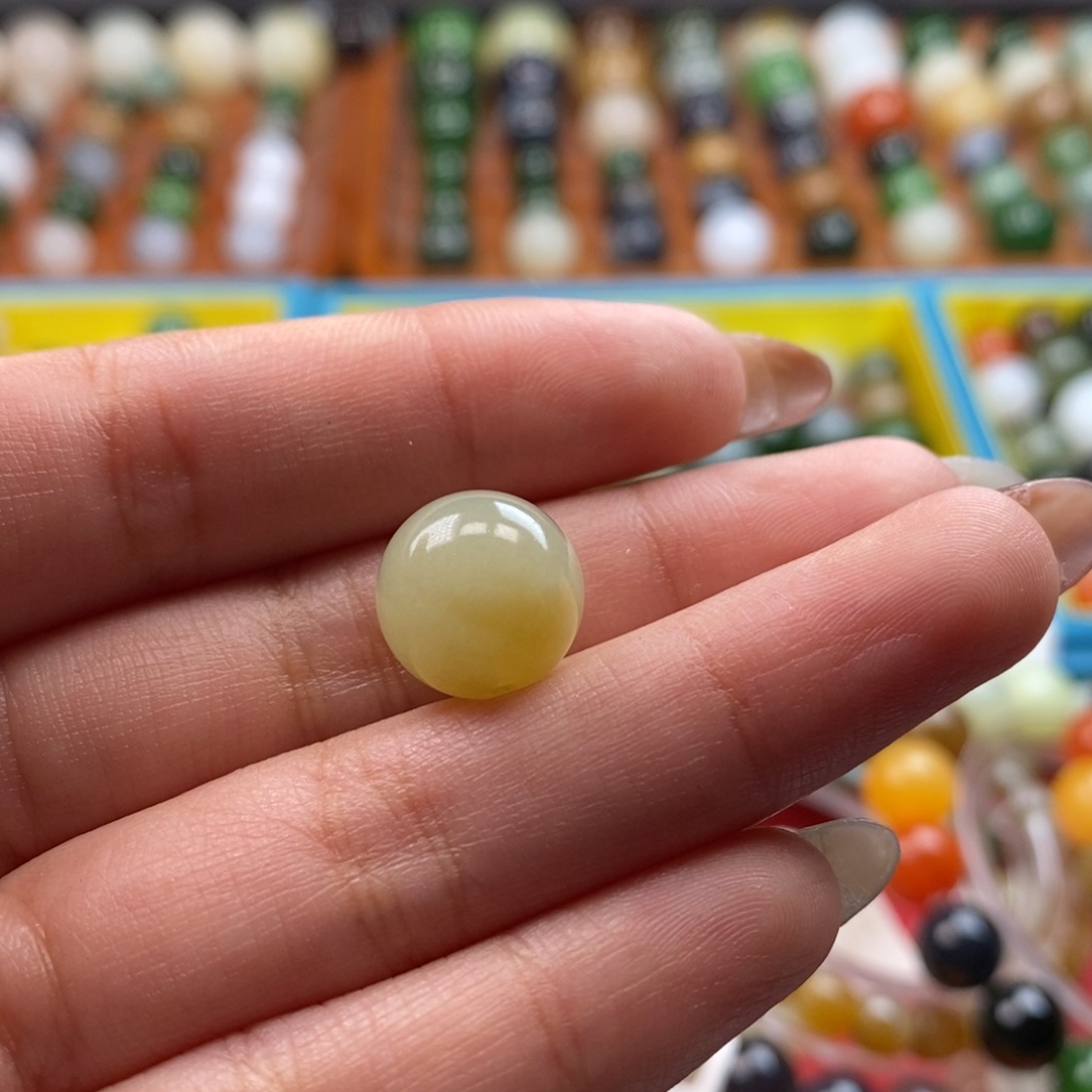 和田玉未镶嵌珠宝奇石福利糖黄口单珠z12（有内裂