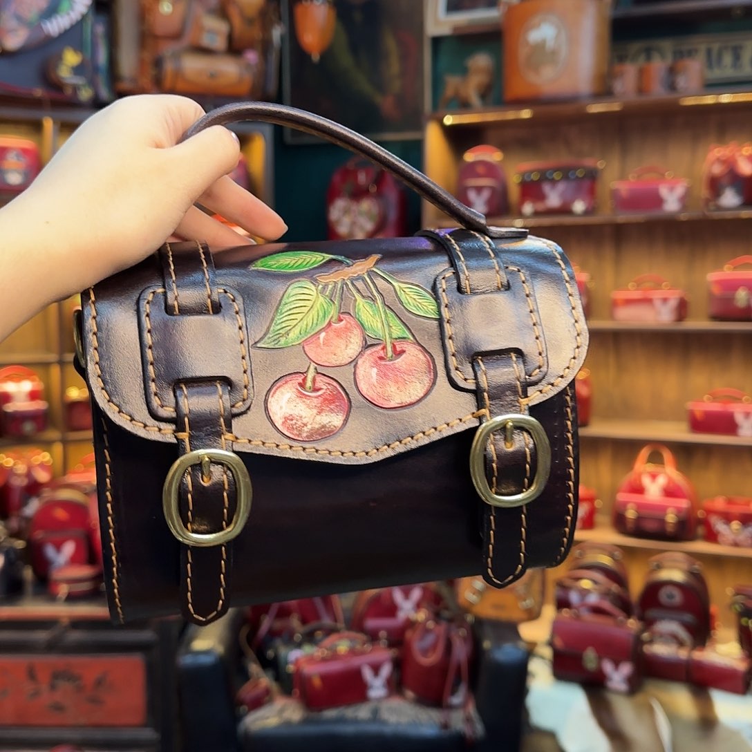 用***＞牦牛剖层皮革锦呈单肩樱桃