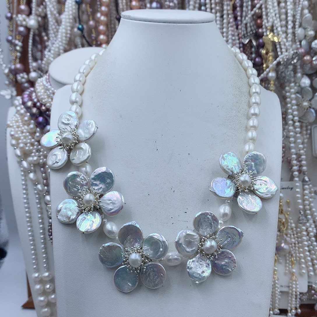 y***n淡水珍珠耳饰银S925镶嵌