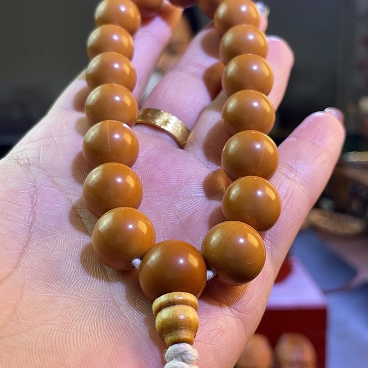 橄榄核吊坠猴头手串