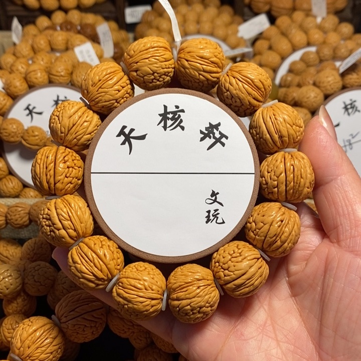 0*.3号链接 桃核手串龙鳞恭喜九22左右