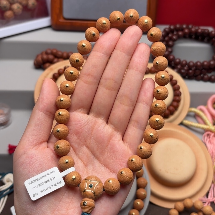 用***5手串凤眼菩提小12铜钉镶嵌手持