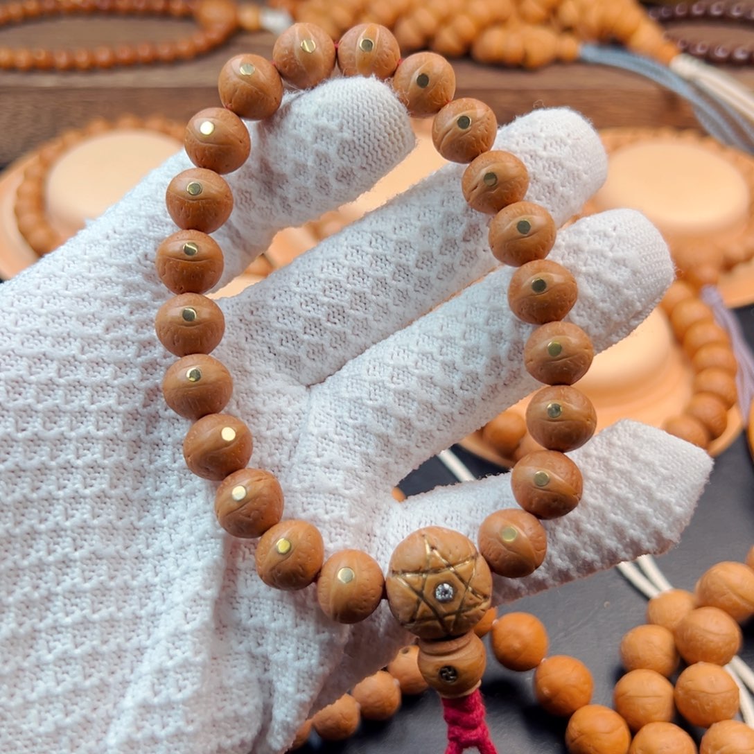 手串凤眼菩提11.5mm奶油皮铜钉