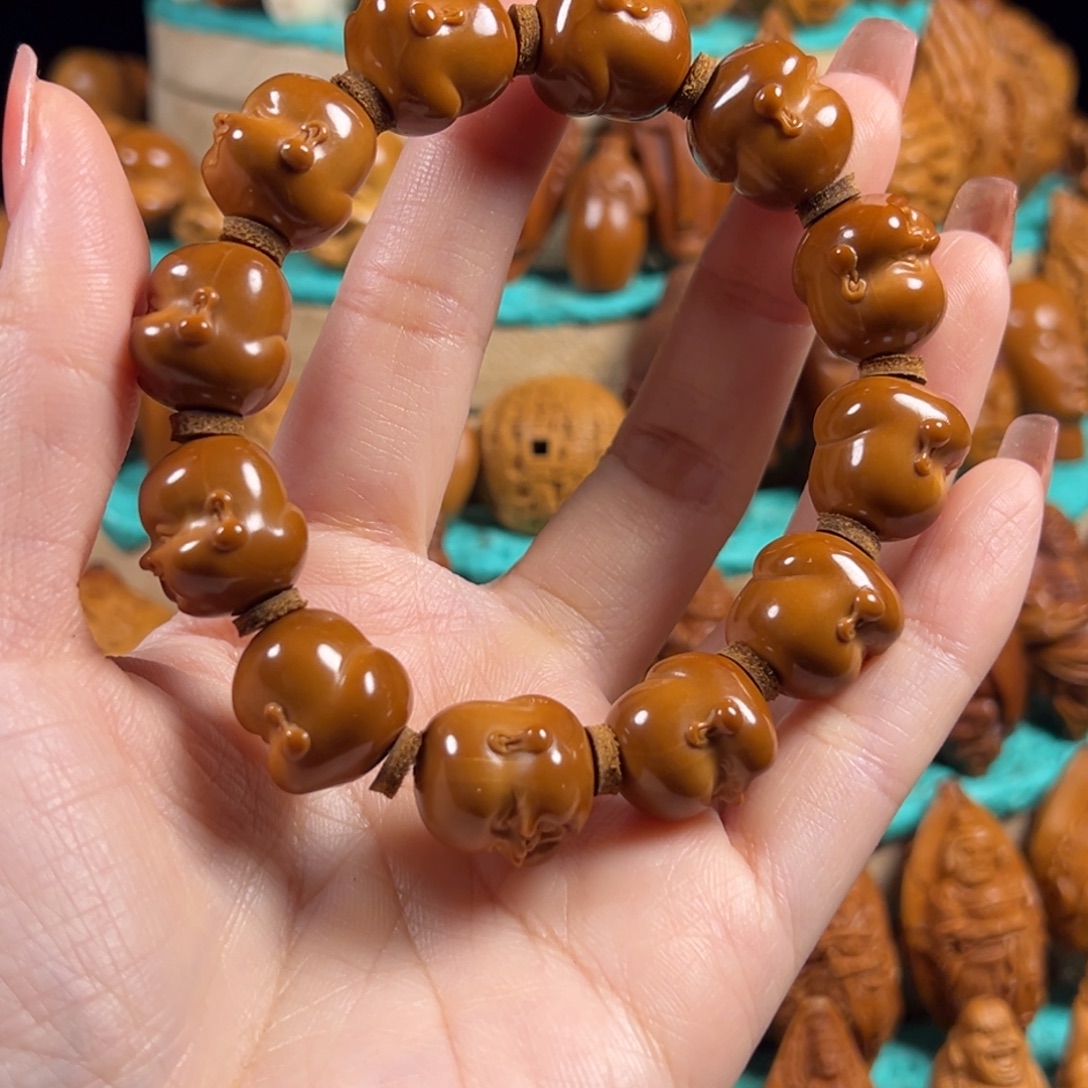 云***轻橄榄核手串/手链笑佛头