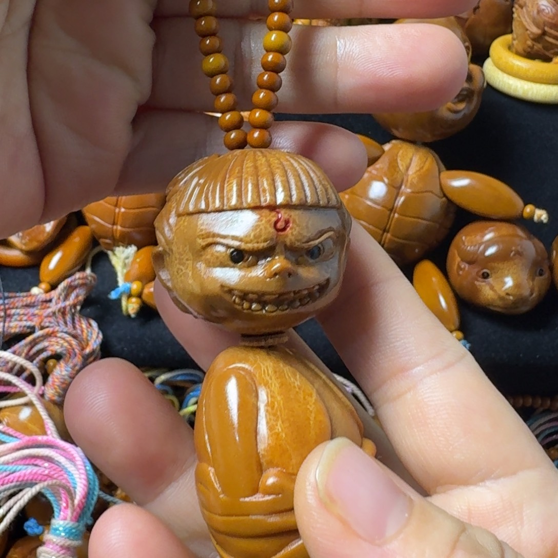 陈***林把件橄榄核小哪吒