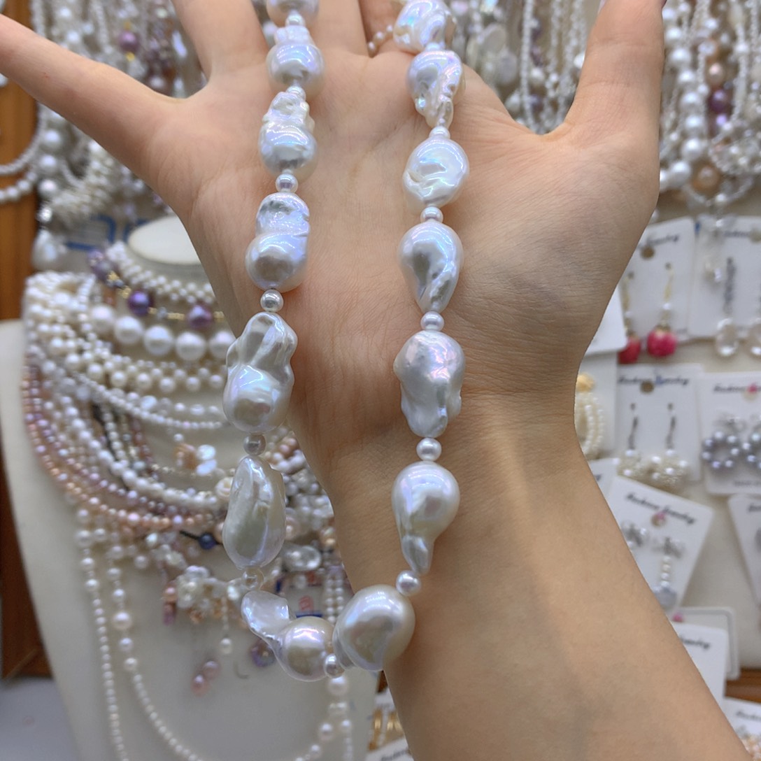 合金淡水珍珠耳饰浮****梦