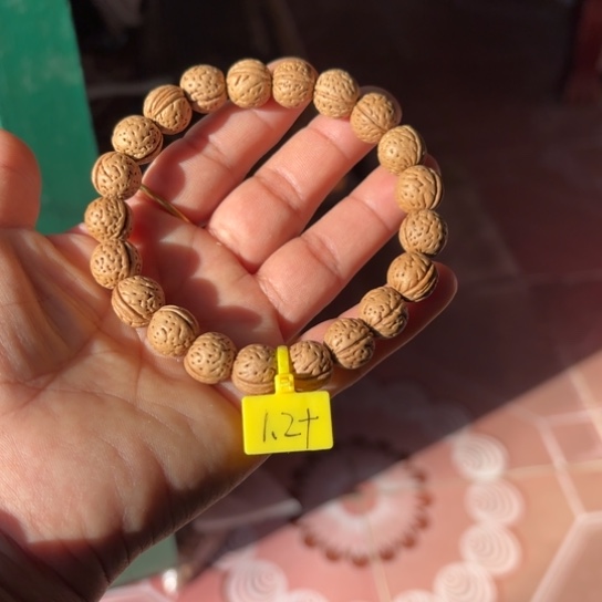 简***单木质野生桃核手串