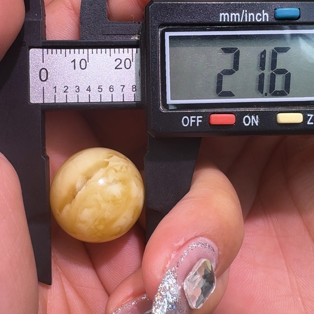 琥珀未镶嵌裸石21.6微微瑕   质检10