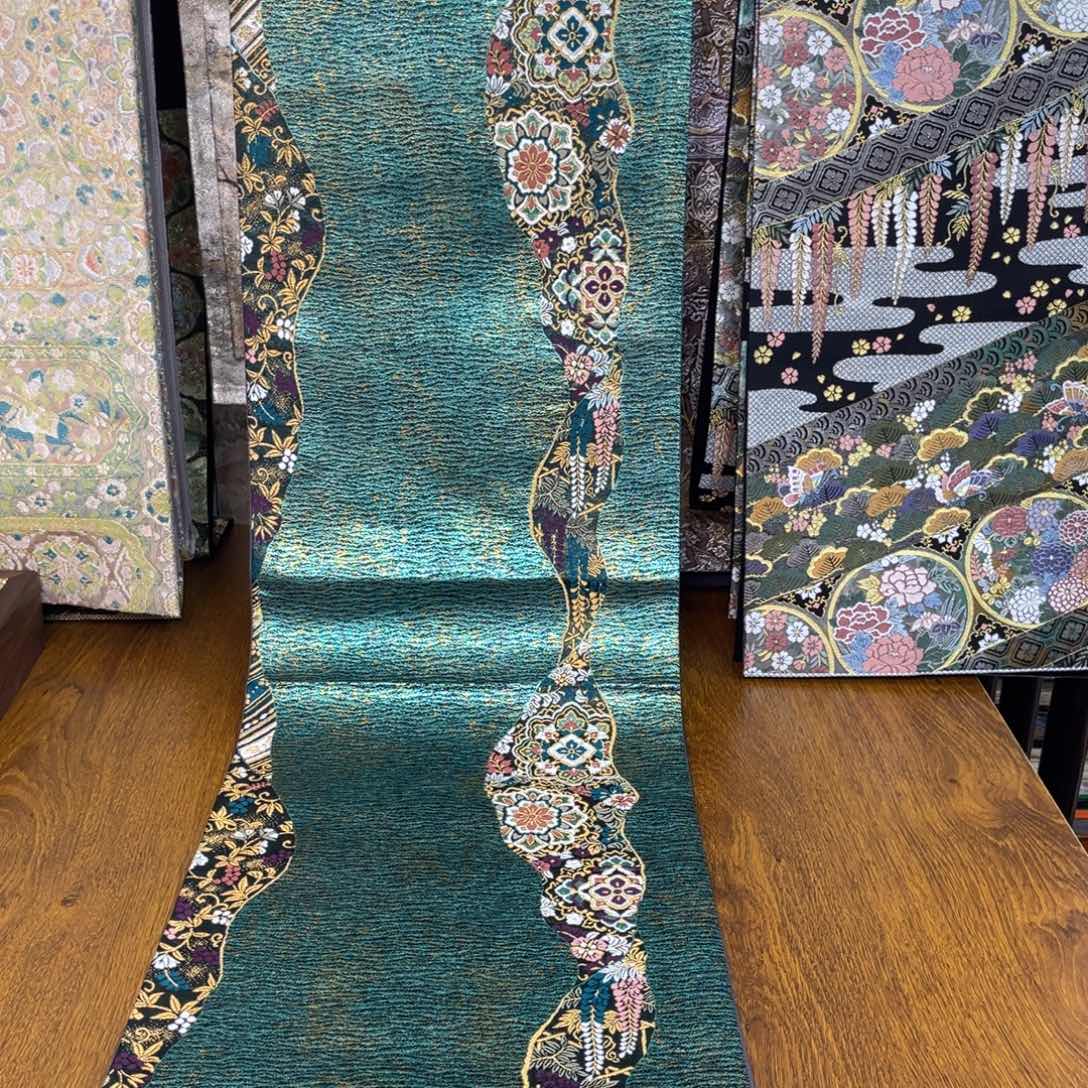 织绣墨绿流水宝相纹