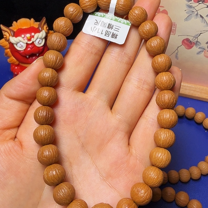 自***_猴头核桃吊坠凤羽