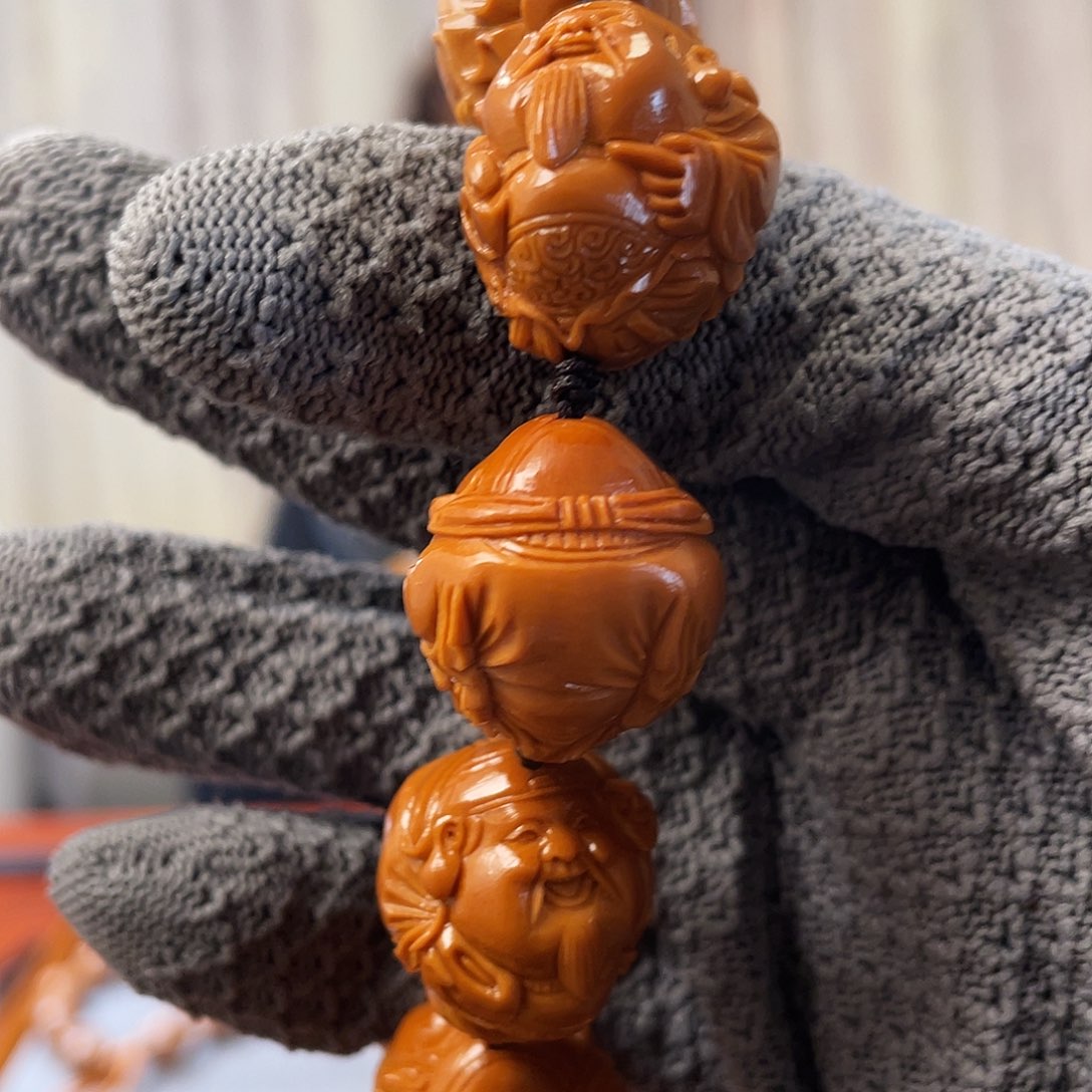 橄榄核吊坠大开脸财神