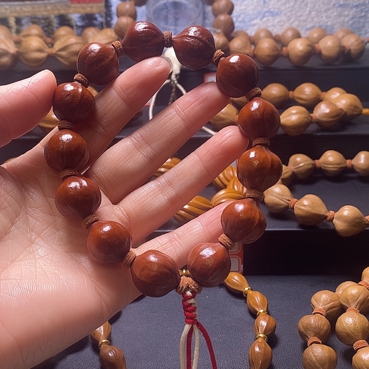 木***鱼手串橄榄核紫皮17×20