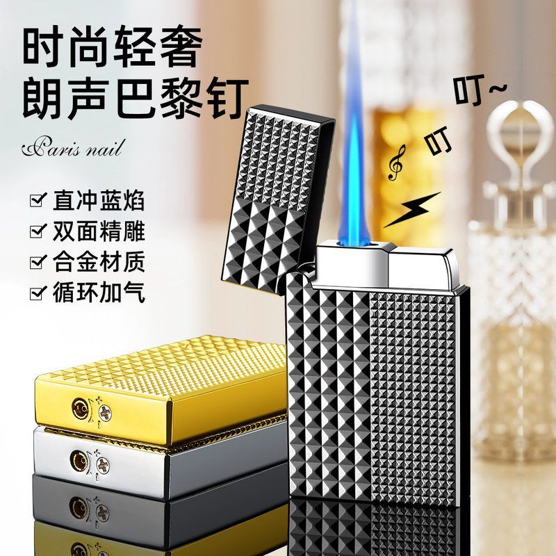 DK726立体精雕巴黎钉钢音朗声直冲强火力蓝焰防风充气打火机