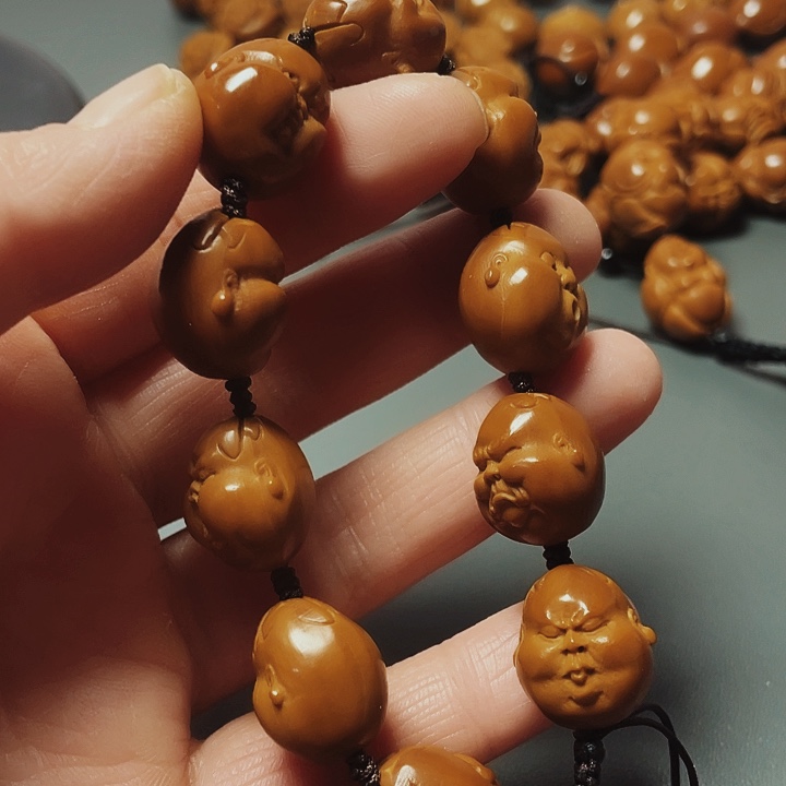 胖百态，橄榄核雕工艺制作