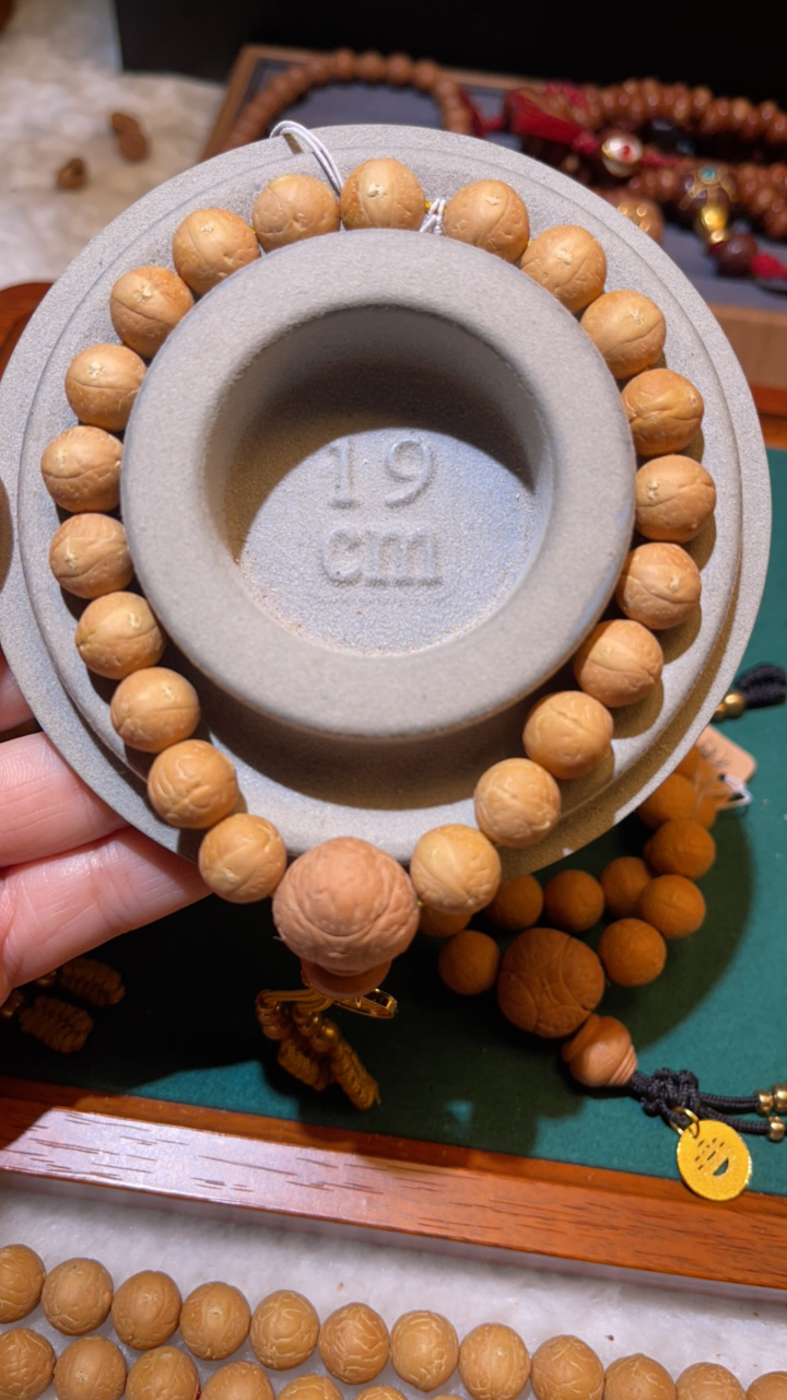 新籽10.5单仓凤眼菩提手串