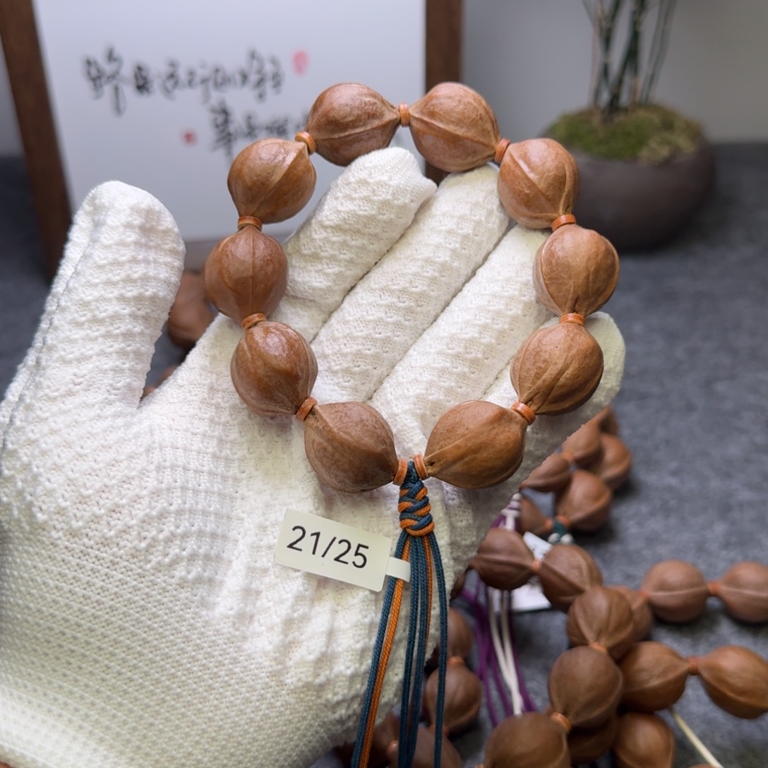 卉***手串/手链橄榄核21/25鲨鱼背