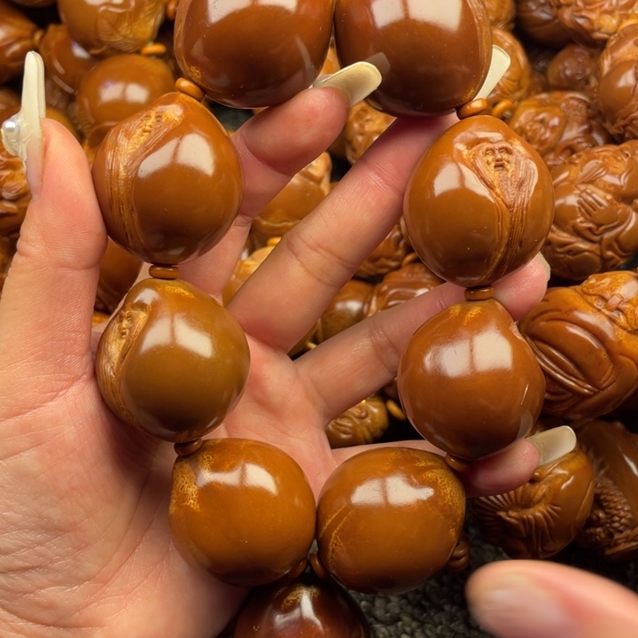 橄榄核吊坠可****石橄榄核