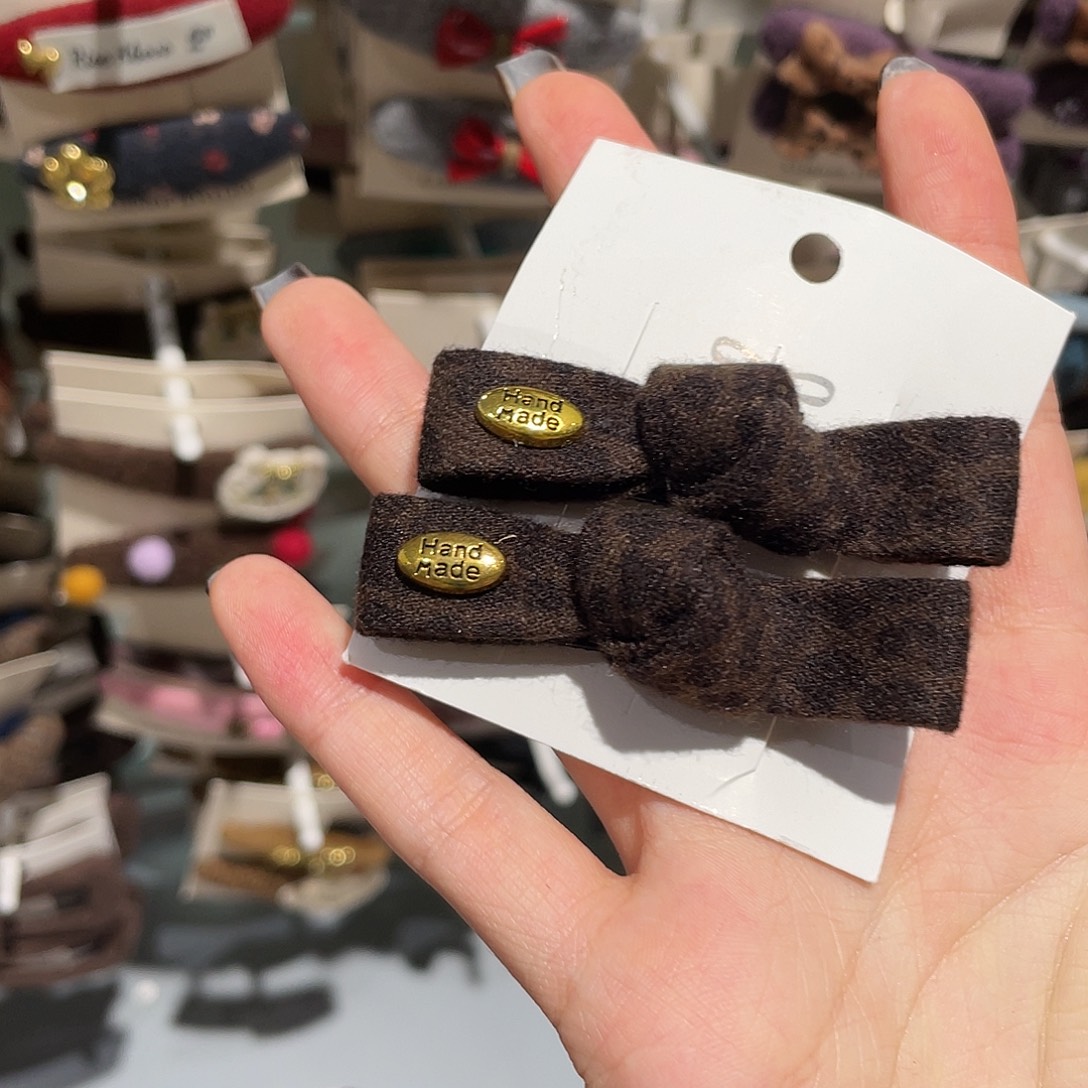 布艺非金属豹纹蝴蝶结鸭架