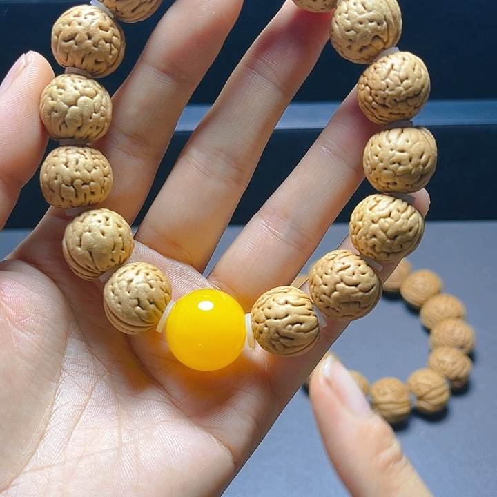 吊坠桃核金丹手串