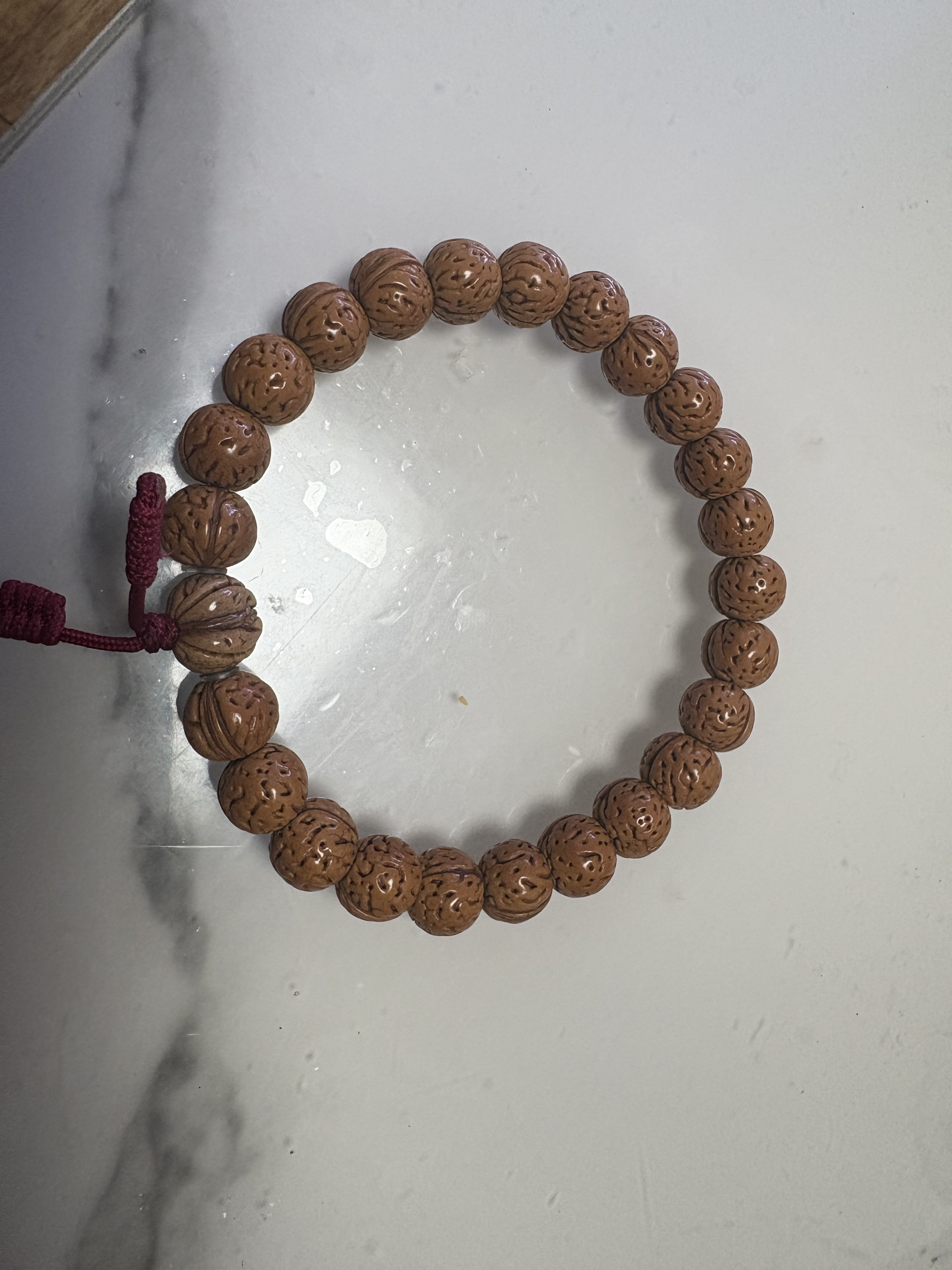 原皮色野生桃核手持值得拥有