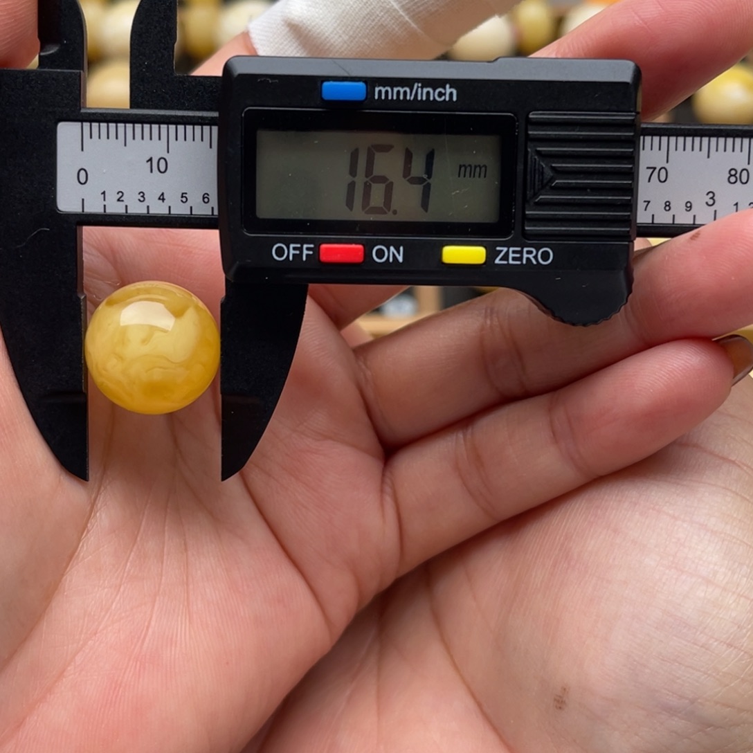 琥珀未镶嵌裸石蜜蜡圆珠笑