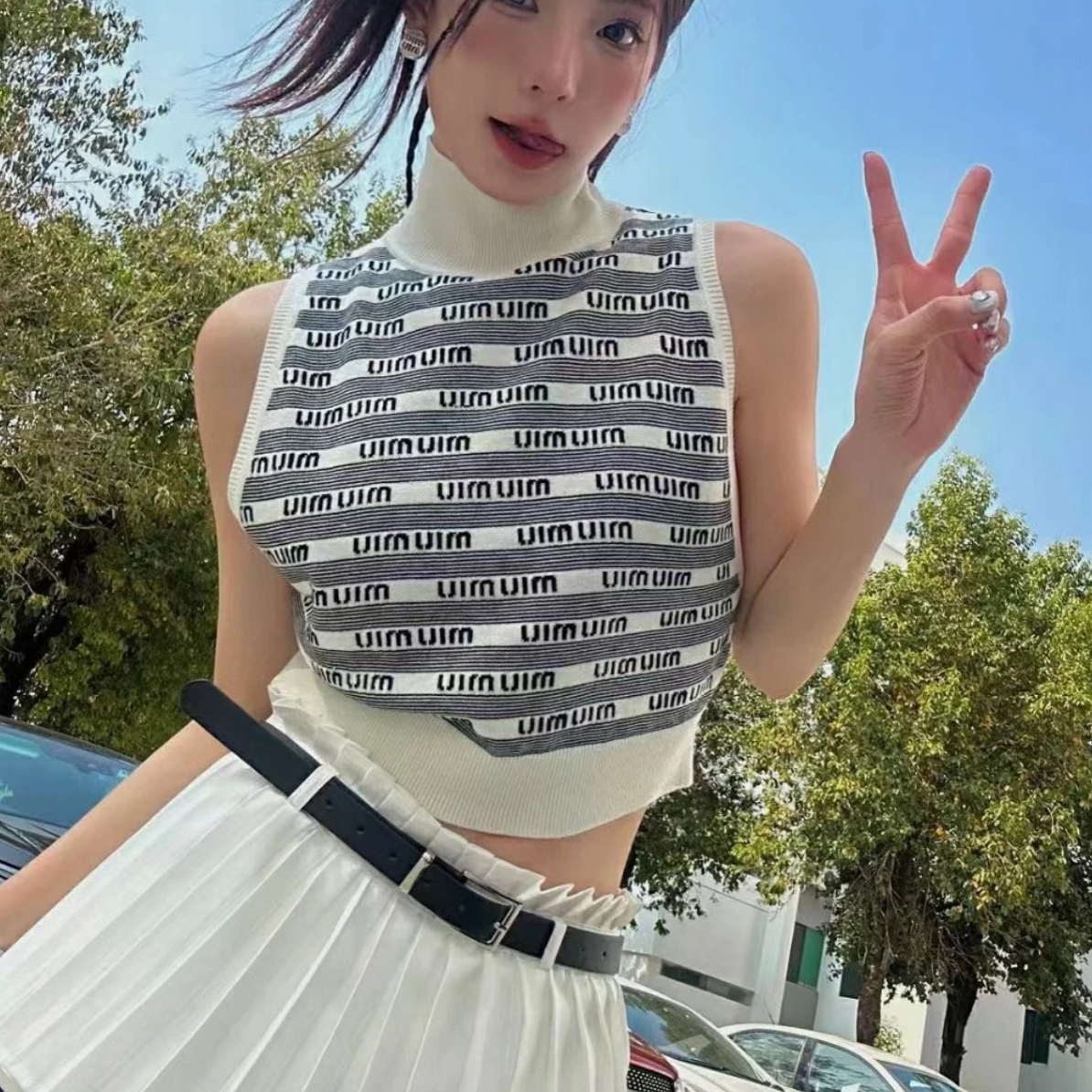 99新 MIU MIU/缪缪 条纹羊绒背心36码