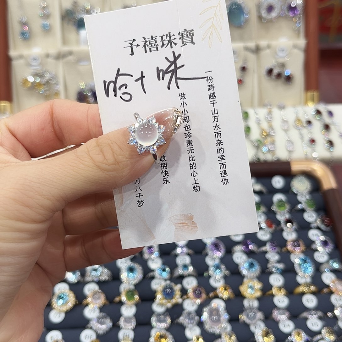 哈***咪蛇纹石玉银S925镶嵌戒指