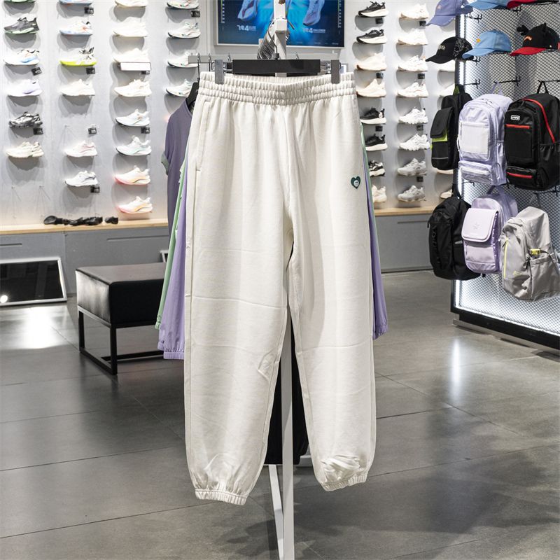 （直播）李宁2024秋运动潮流针织时尚宽松休闲束脚卫裤女子AKLU570