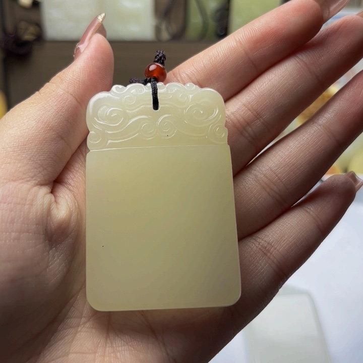 受****q石材方解石手把件
