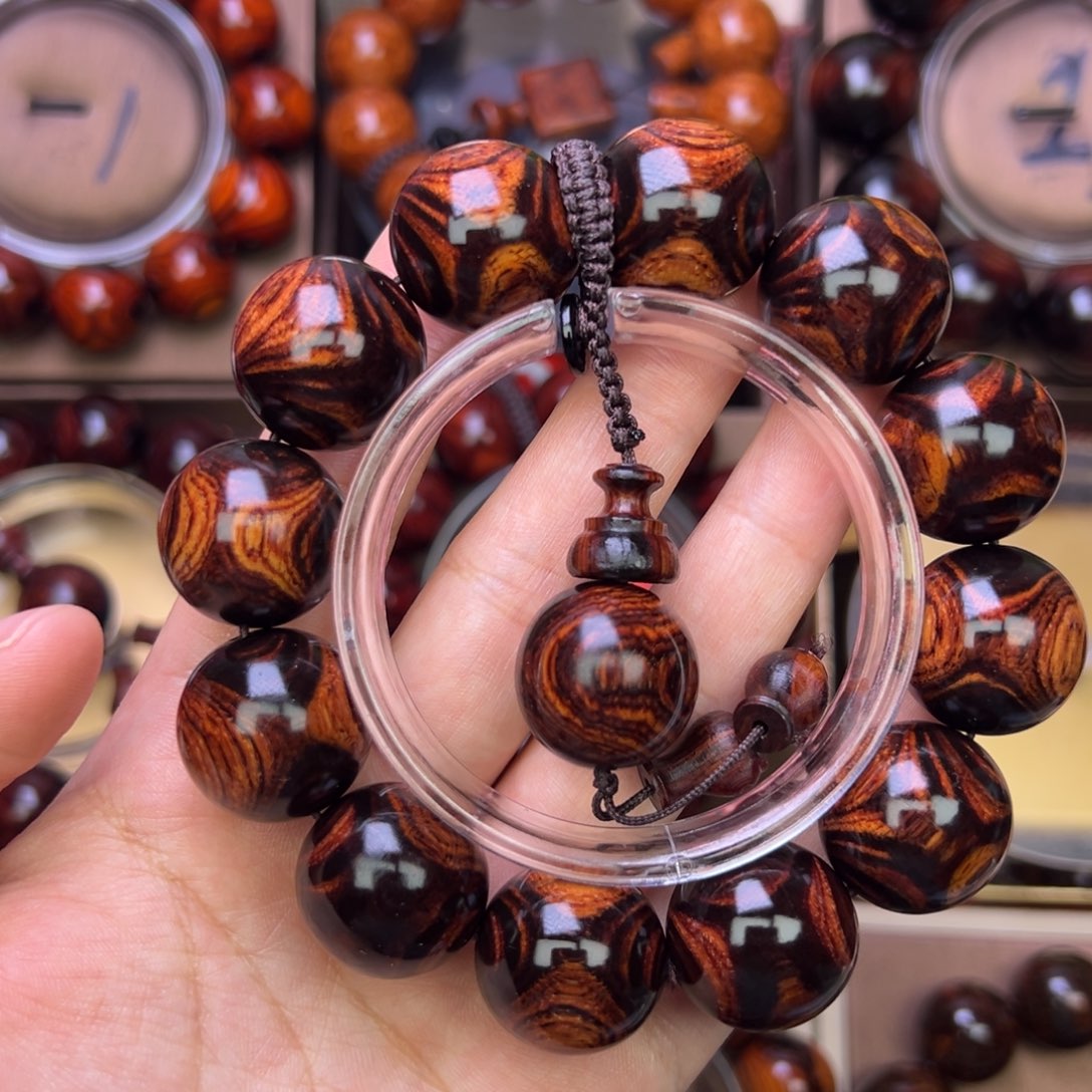 木质类黄花梨鬼脸对眼成品手串