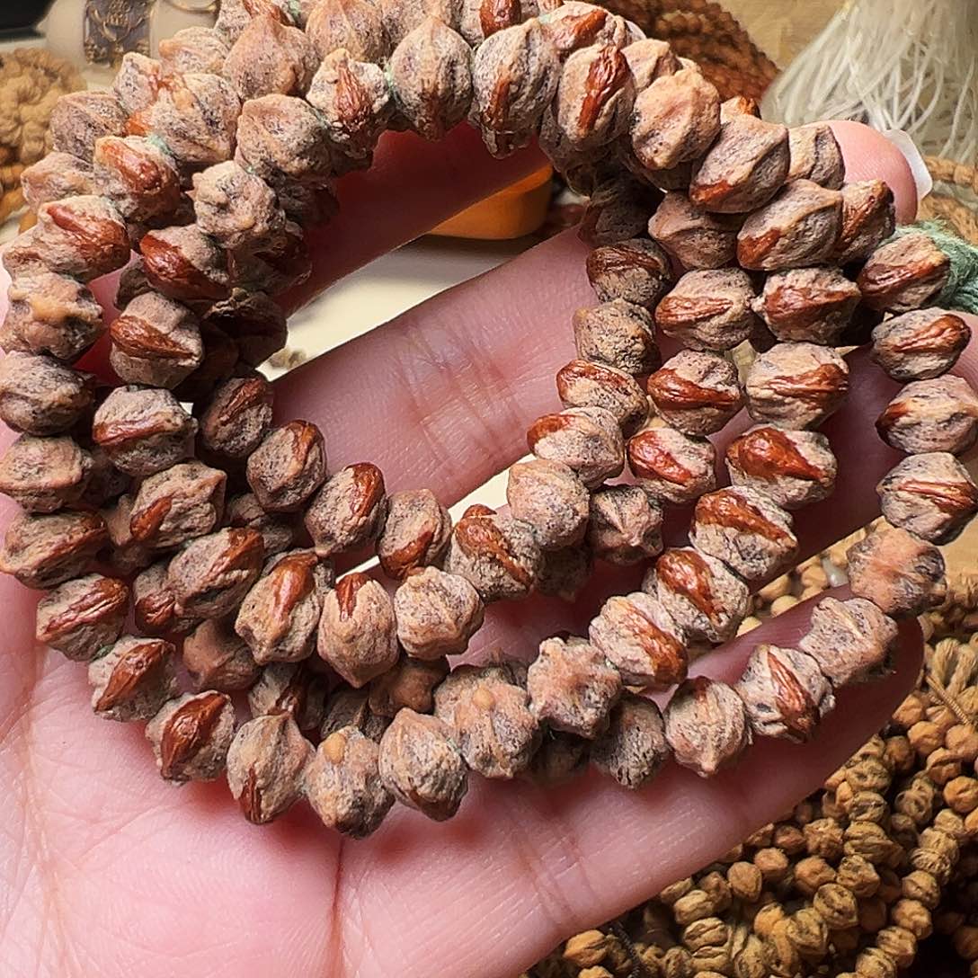 哈***塔柏香籽/百香籽吊坠