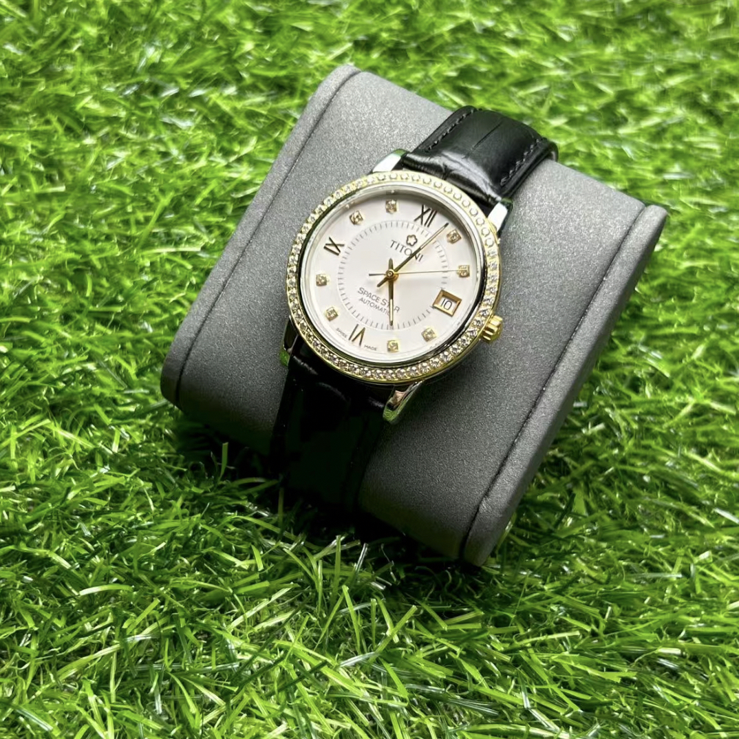 95新 Titoni/梅花1 95新梅花自动机械表中性表