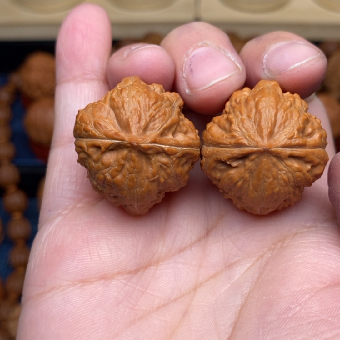 文玩核桃把件手捻寿星头