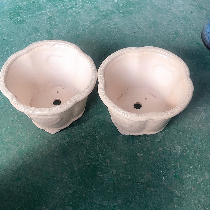 红陶口16。高11。。。。