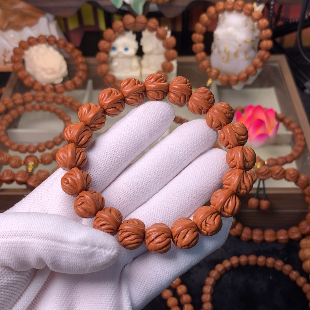 张***售桃核吊坠双脊龙手串14