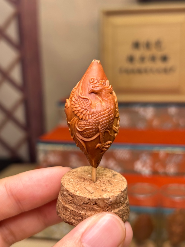 橄榄核手工雕刻浮雕凤凰梅林核单籽2.35*4.3