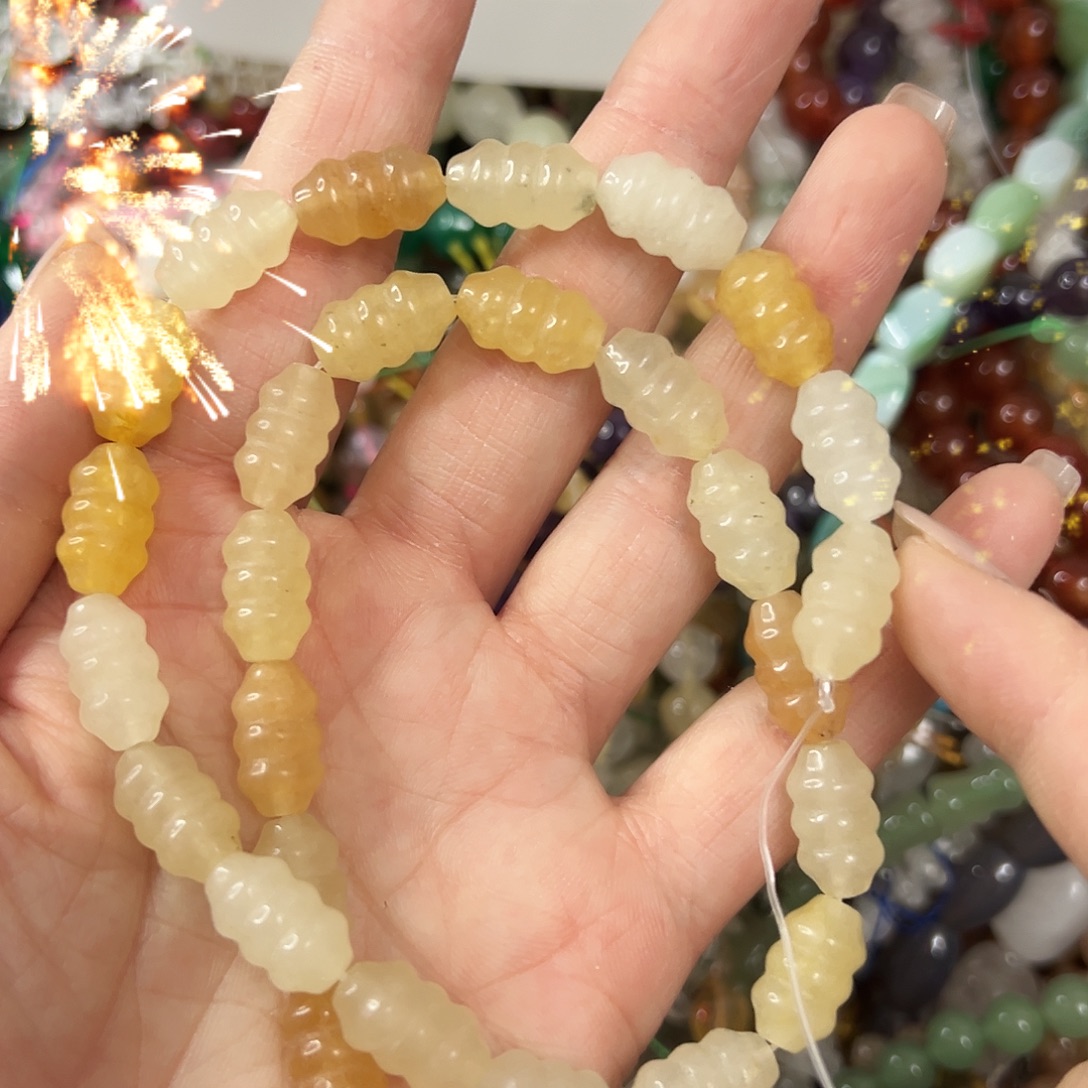 玛瑙/玉髓未镶嵌珠宝半成品，金丝玉云朵珠一条