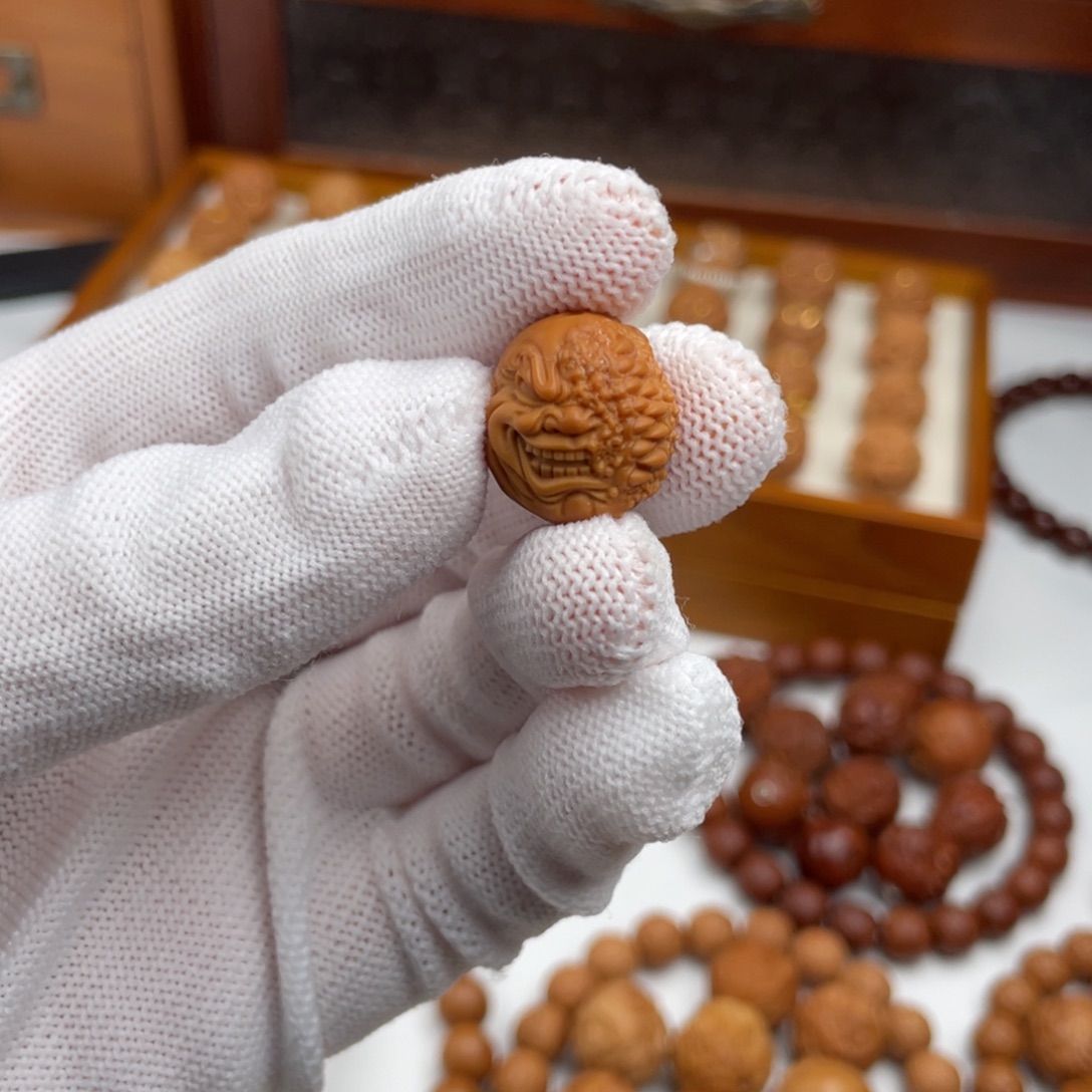 爱***面猴头核桃吊坠猴头核桃雕刻