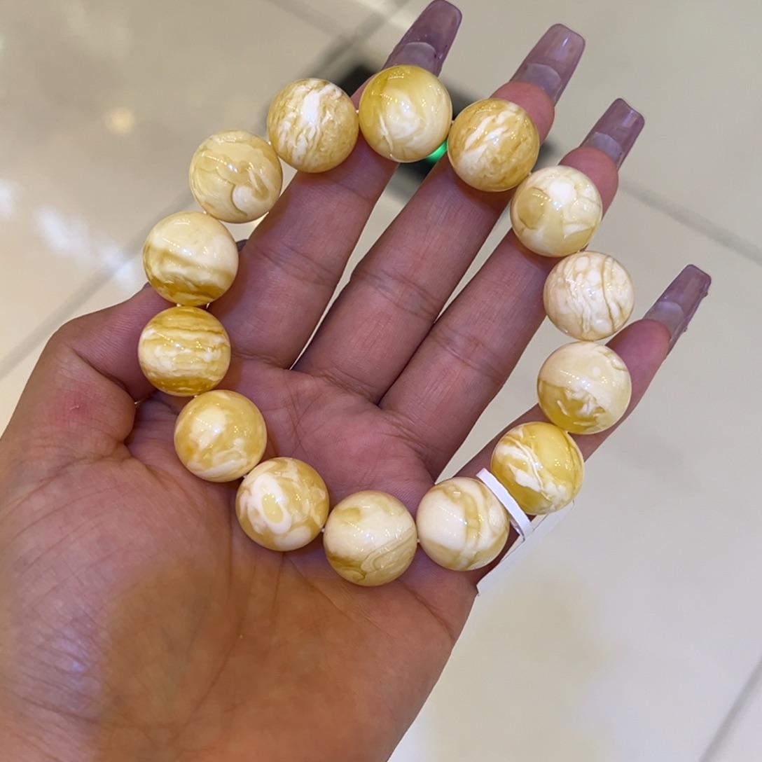 未镶嵌琥珀裸石杭****销16加白花圆珠手串