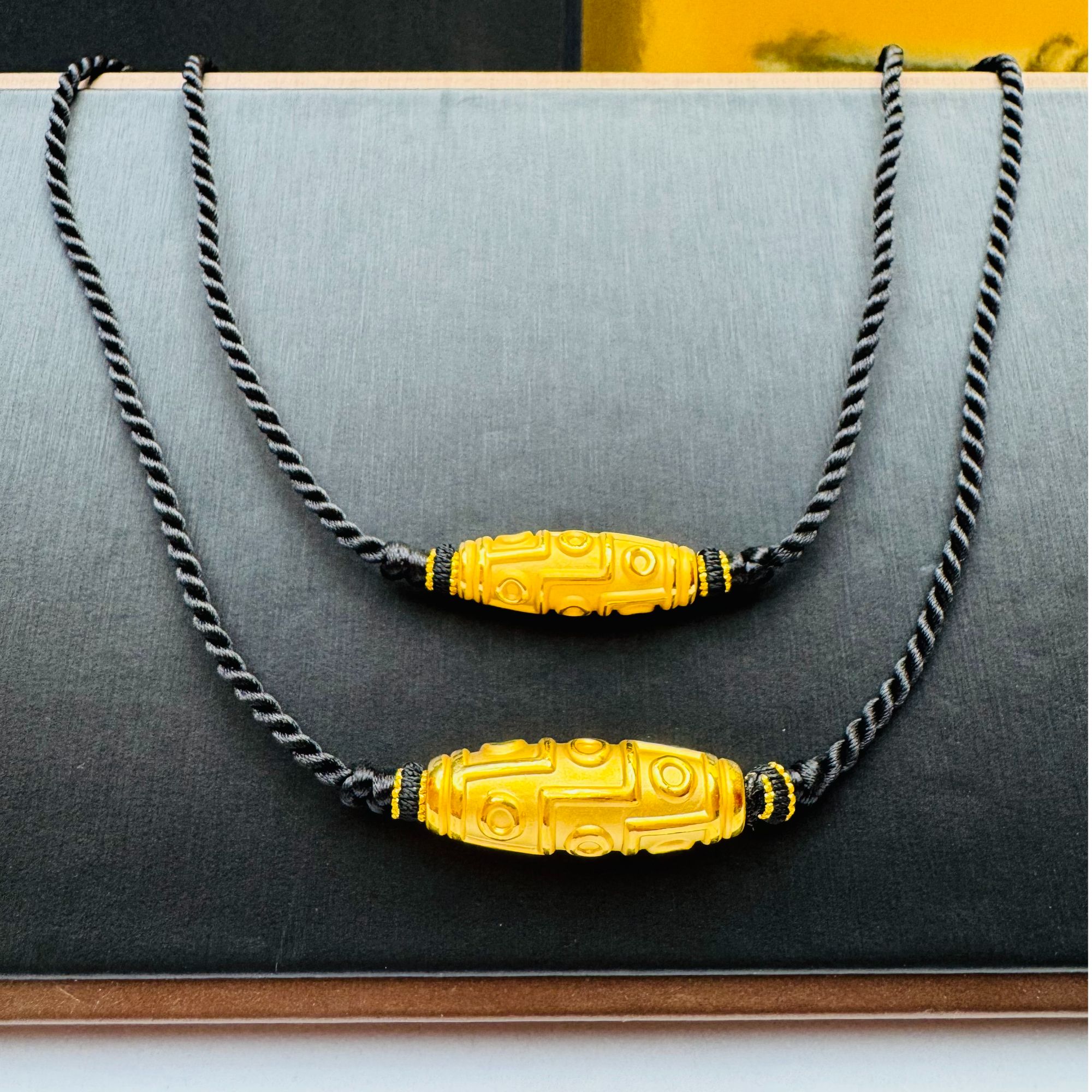 64#足金999黄金 九眼珠珠黑绳编织 多样性发一