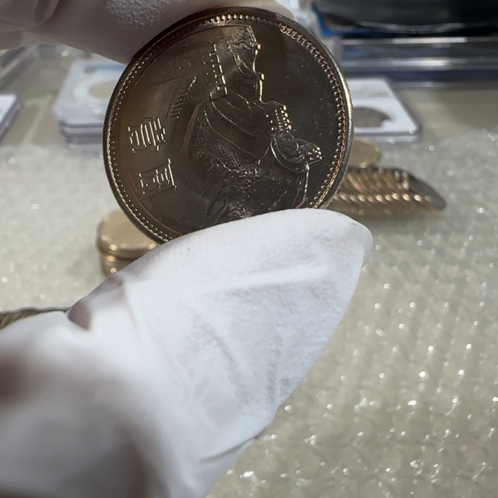 1985年长城币宽版卷拆品一枚