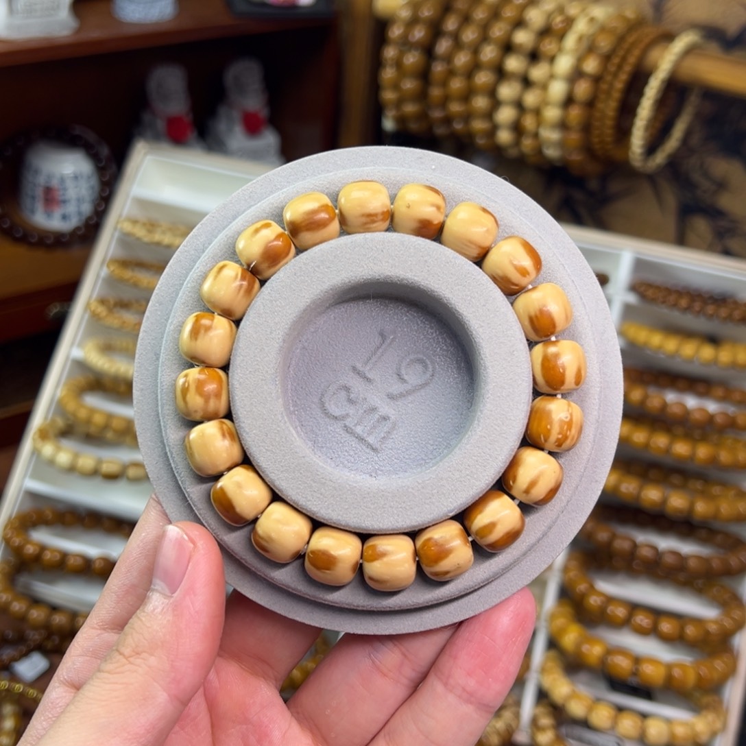 賈***非金属紫金鼠11.3*10.5实心三花火焰老型