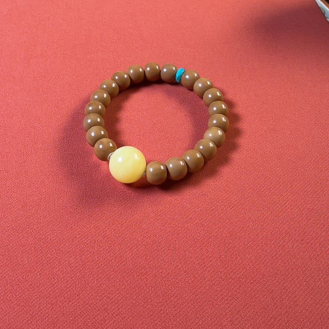 阳***宝核桃未镶嵌手串蜜蜡