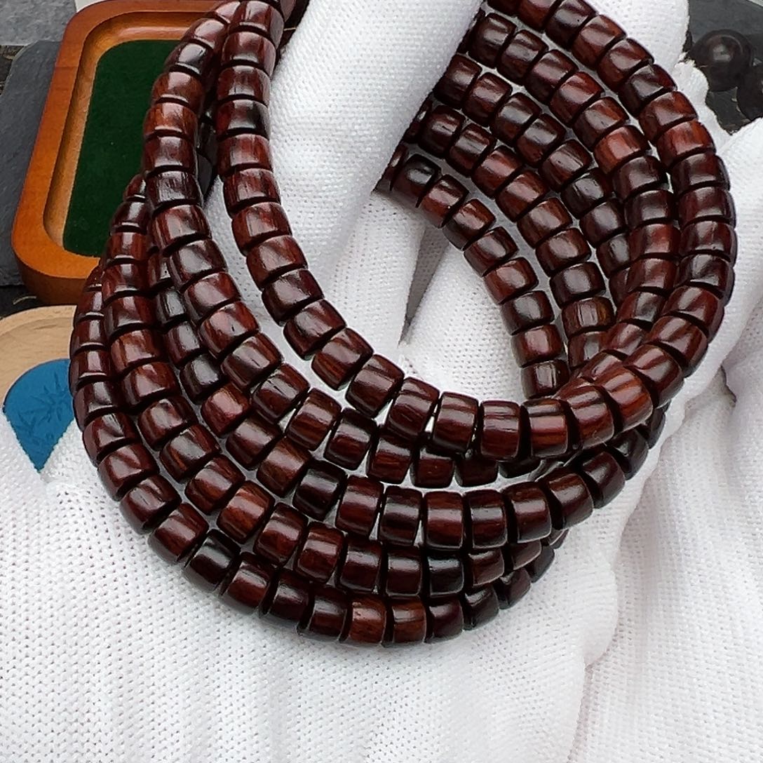 木4x7药片珠海南红降黑金（瑕疵