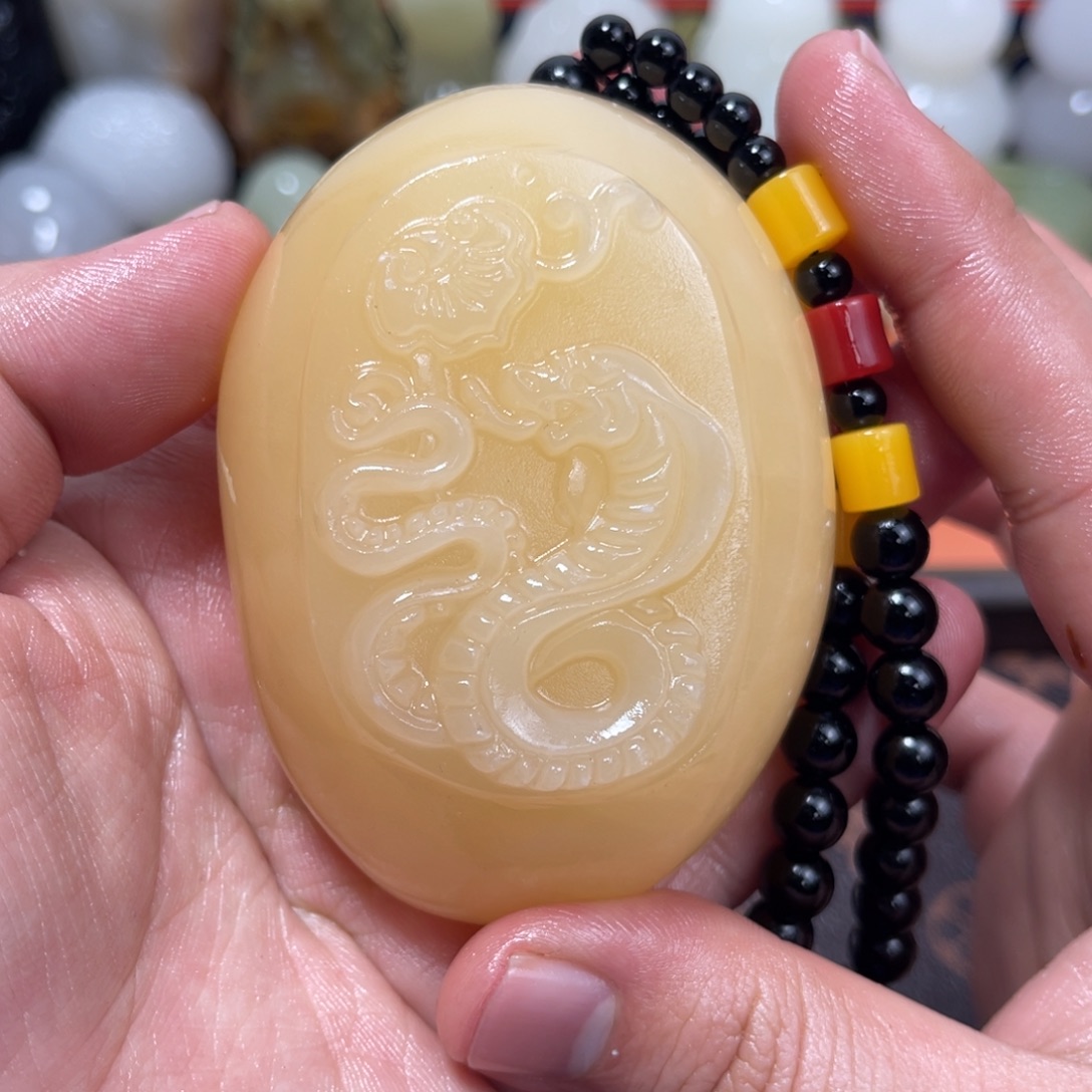 嗯***石材石材方解石手把件不退换