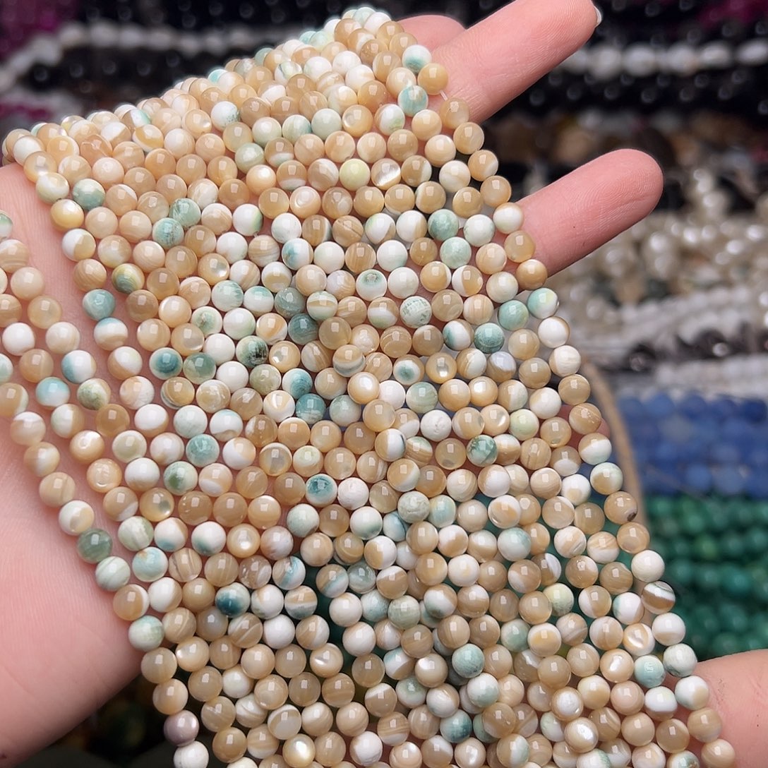 玛瑙/玉髓合金珠宝半成品V398。5mm天然夜光螺圆珠一条