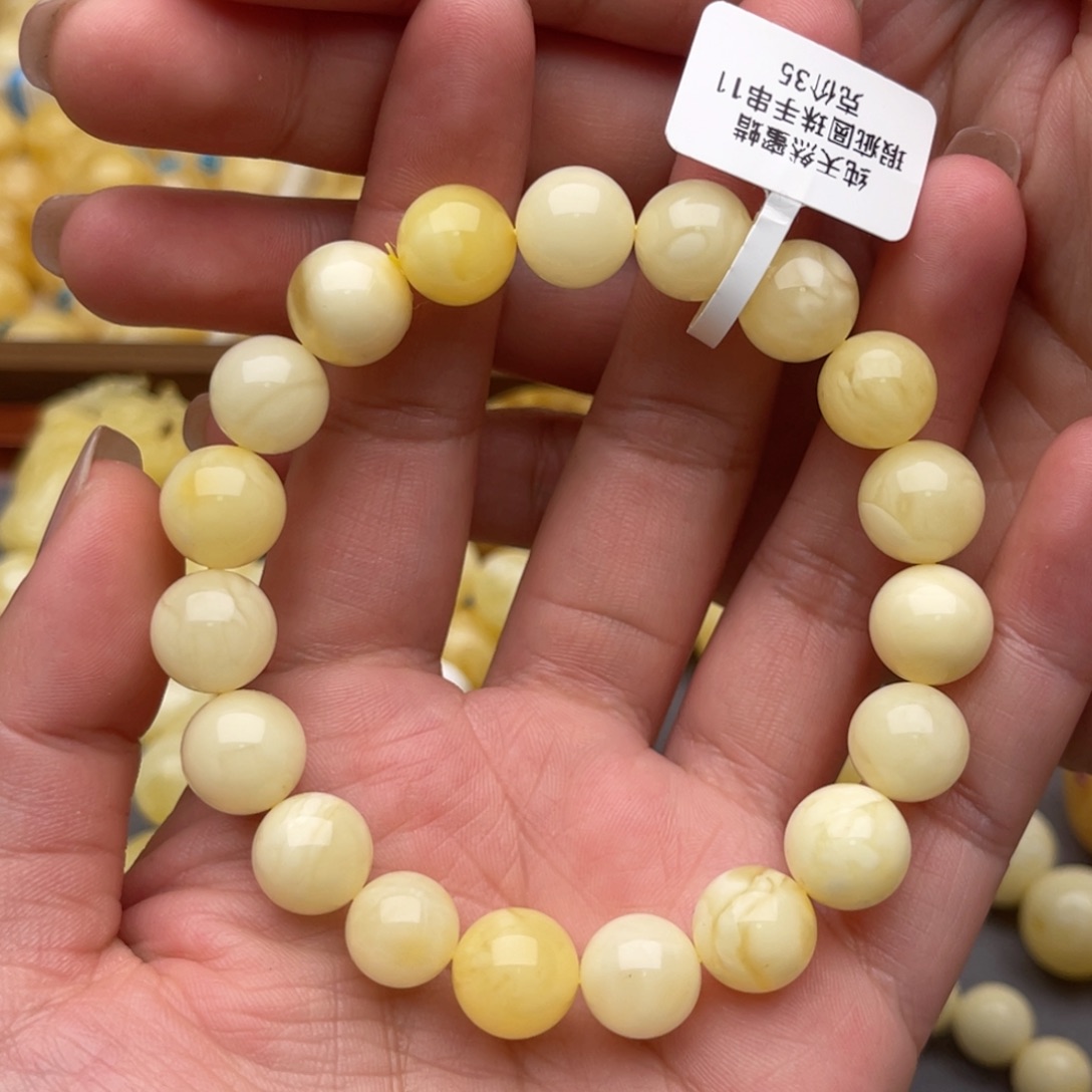 裸石琥珀未镶嵌重****填蜜蜡圆珠手串卡十一瑕疵