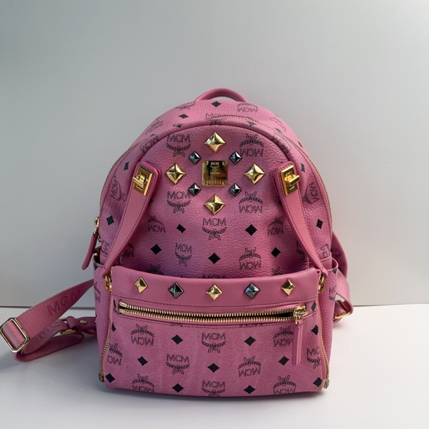95新 MCM MCM粉色铆钉双肩包